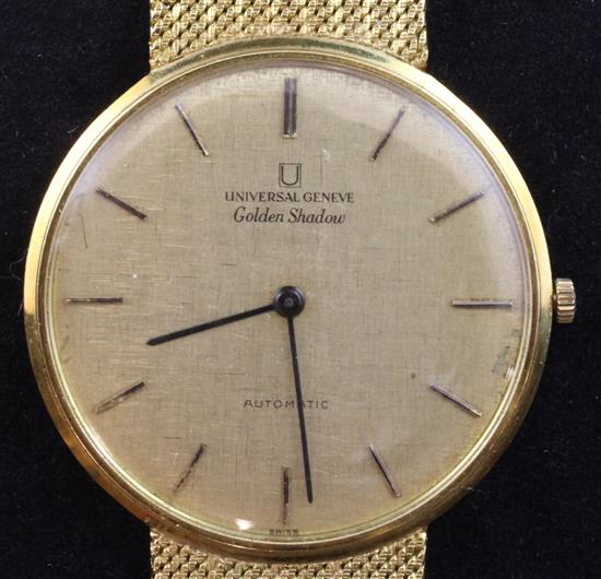 A gentlemans 18ct gold Swiss Universal Golden Shadow automatic wrist watch, with pamphlet.